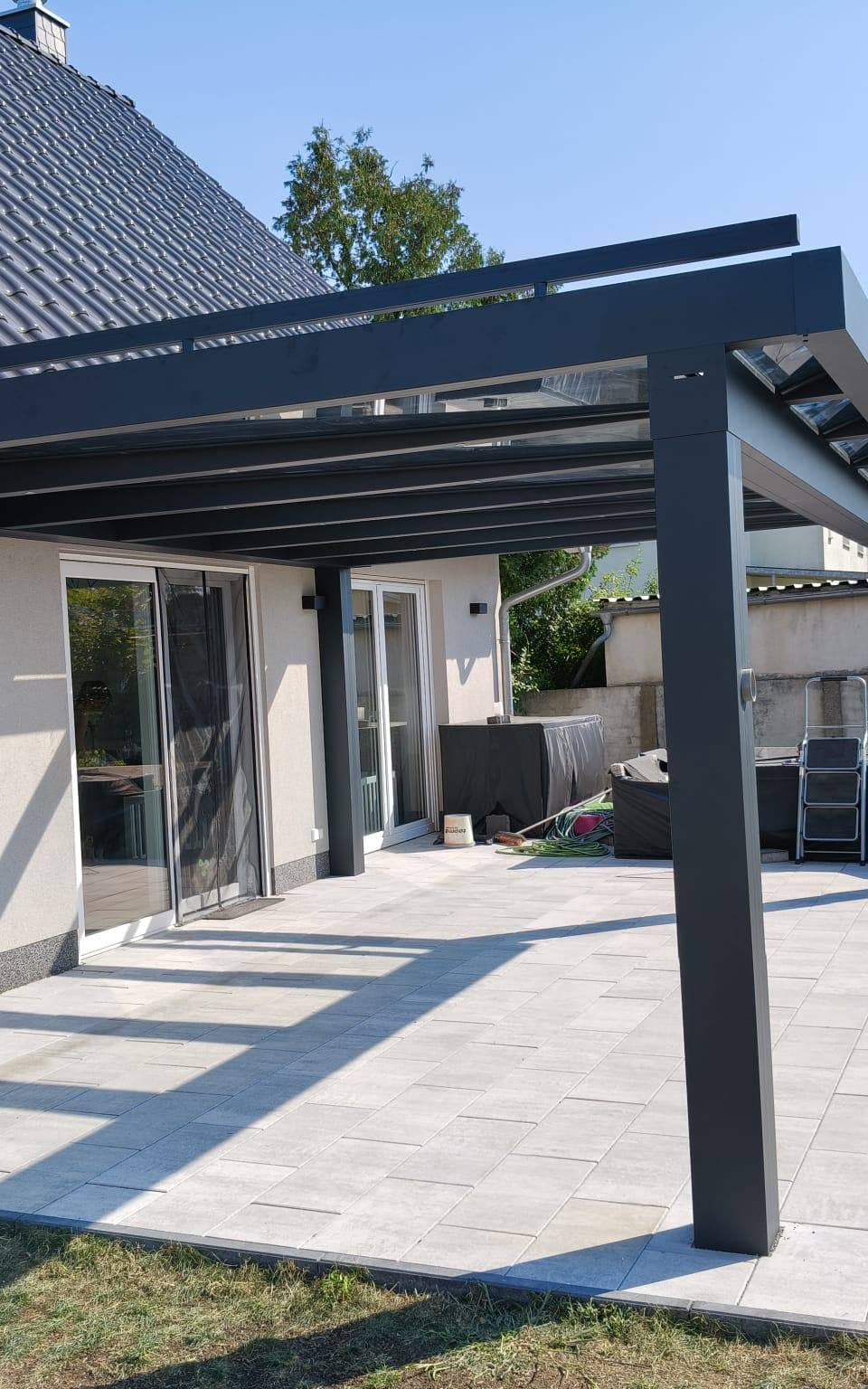 Zadaszenie tarasu Ultrastyle pod okapem domu w Brieskow-Finkenheerd: zdjęcie 2