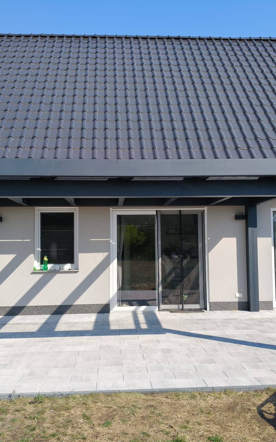 Zadaszenie tarasu Ultrastyle pod okapem domu w Brieskow-Finkenheerd: zdjęcie 4